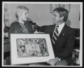 Senator Robert Morgan receives painting from Eddie Barclay